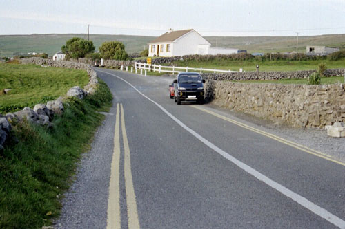 yellow lines just move the problem along to a more dangerous section of the road!