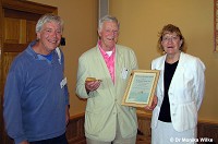 Dr Horace Dobbs receiving his lifetime services to dolphins award